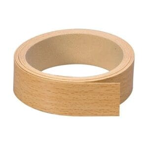 Rol voorgelijmd kantenband in beuken en titan voor de afwerking van meubelpanelen in de caravan.